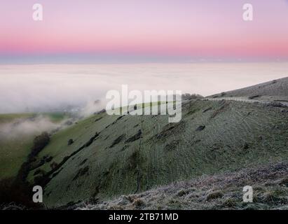 Winter sunset cloud inversion from Butts Brow on the south downs ...