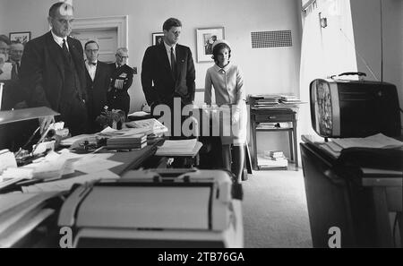 Watching flight of Astronaut Shepard on television. Attorney General Kennedy, McGeorge Bundy, Vice President Johnson... Stock Photo