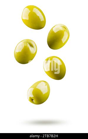 Green olives falling isolated on white background Stock Photo