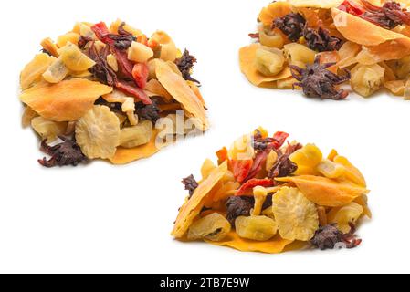 Mix of dried exotic fruit, mangos,slices of pineapples, passion fruit, papaya. Vegetarian dessert. Stock Photo