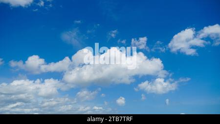 Photo of some white whispy clouds and blue sky cloudscape. The summer ...