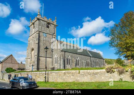 West Street, Corfe Castle, UK - September 14th 2023: The Parish Church Saint Edward, King and Martyr is dedicated to St Edward the Martyr who was murd Stock Photo