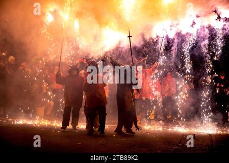 Ceret (south of France): Correfocs (literally in English fire-runs) are among the most striking features present in Valencian and Catalan festivals. M Stock Photo