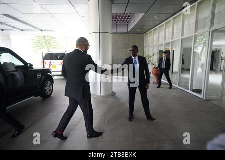 Home Secretary James Cleverly meeting Rwandan Minister of Foreign Affairs Vincent Biruta ahead of signing a new treaty with Rwanda. The treaty will address concerns by the Supreme Court, including assurances that Rwanda will not remove anybody transferred under the partnership to another country. Picture date: Tuesday December 5, 2023. Stock Photo
