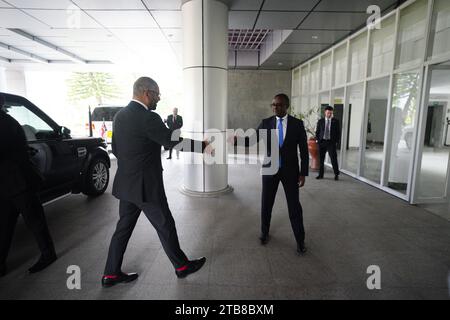 Home Secretary James Cleverly meeting Rwandan Minister of Foreign Affairs Vincent Biruta ahead of signing a new treaty with Rwanda. The treaty will address concerns by the Supreme Court, including assurances that Rwanda will not remove anybody transferred under the partnership to another country. Picture date: Tuesday December 5, 2023. Stock Photo