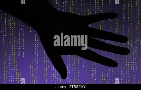 Artificial  intelligence concept, silhouette of human hand in front of device screen with running ai program and data processing Stock Photo
