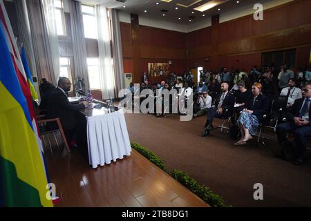 Home Secretary James Cleverly speaks during a press conference with Rwandan Minister of Foreign Affairs Vincent Biruta after the signing of a new treaty. The treaty will address concerns by the Supreme Court, including assurances that Rwanda will not remove anybody transferred under the partnership to another country. Picture date: Tuesday December 5, 2023. Stock Photo