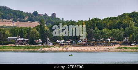 Lake “lac de Panthier” in the Cote d'Or department (north-eastern France): tourists on a beach by the lake in summer Stock Photo