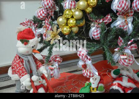 Christmas tree base with golden balls and Santa Claus. Brazil Stock Photo