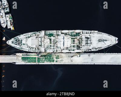 Lenin Soviet nuclear-powered icebreaker in port of Murmansk among the ships. Top view. Stock Photo