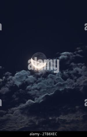 Full moon twilight with craters on the surface and dark sky, close up nature background Stock Photo