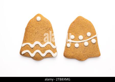 Gingerbread cookie of a Christmas bell with icing isolated on white background Stock Photo