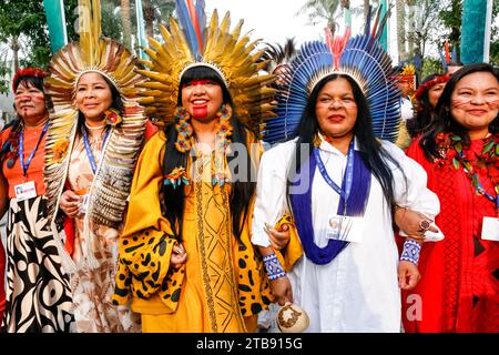 Indigenous women of Amazonia march in a show of solidarity on the allies Exhibition Center during the COP28, UN Climate Change Conference, held by UNFCCC in Dubai Exhibition Center, United Arab Emirates on December 5, 2023. Climate Conference COP28, runs from November 29 to December 12, The leaders will outline their path towards national climate goals. Stock Photo