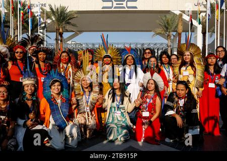 Indigenous women of Amazonia march in a show of solidarity on the allies Exhibition Center during the COP28, UN Climate Change Conference, held by UNFCCC in Dubai Exhibition Center, United Arab Emirates on December 5, 2023. Climate Conference COP28, runs from November 29 to December 12, The leaders will outline their path towards national climate goals. Stock Photo