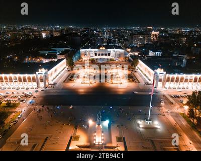 Bishkek, Kyrgyzstan - July 15, 2023: Aerial view of Bishkek city's Ala-Too central square at night Stock Photo