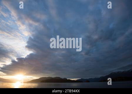 Sunset reflected in the Inside Passage; Alaska, United States of America Stock Photo