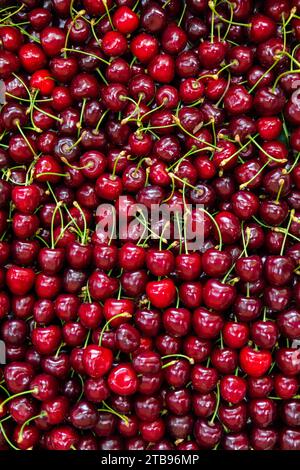 Texture of ripe cherries in a row Stock Photo - Alamy