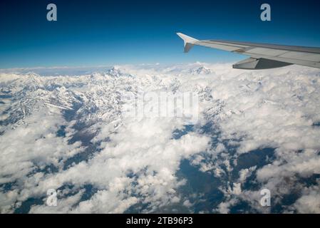 Mount Everest viewed from the window of a jet in the Himalayas; Nepal Stock Photo