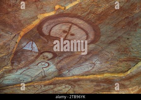 Wandjina spirit figures in a cave at Raft Point, part of the Bradshaw Rock Paintings collection of prehistoric Australian art Stock Photo