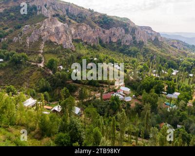 Aerial view of Arslanbob village known for large wild walnut (Juglans regia) forest in the Jalal-Abad Region of Kyrgyzstan Stock Photo