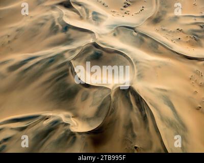Aerial view of windswept sand dunes within Namib-Naukluft Park; Sossusvlei, Namibia Stock Photo