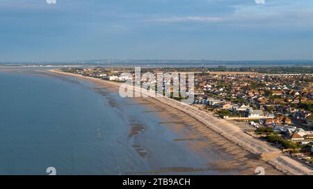 Bracklesham Bay on a sunny summer morning. Elevated view showing the great beach and seaside landscape. Groynes protecting the beach from erosion. Stock Photo