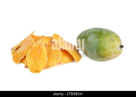 Dried mango slices and whole Egyptian mango fruit isolated on white background. Copy space. Stock Photo