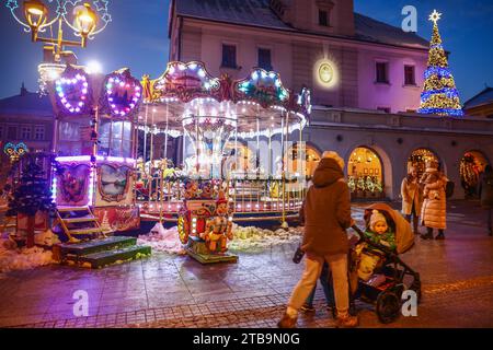 Gliwice, Poland. 5th Dec, 2023. Old fashioned French carousel and Christmas decorations are seen during Christmas market at the main square in Gliwice, Poland on December 5, 2023. (Credit Image: © Beata Zawrzel/ZUMA Press Wire) EDITORIAL USAGE ONLY! Not for Commercial USAGE! Credit: ZUMA Press, Inc./Alamy Live News Stock Photo