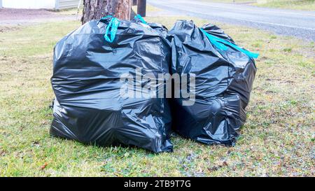 Full Bags of Garbage Waiting for Pickup Stock Photo