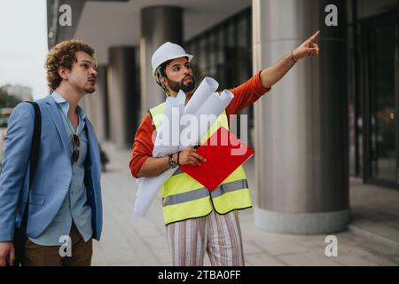 Working Professionals Collaborating on Urban Project Design and Supervision Stock Photo