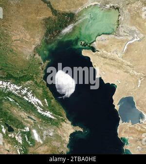 A lone cloud with well-defined edges hovers over part of the Caspian Sea. Stock Photo