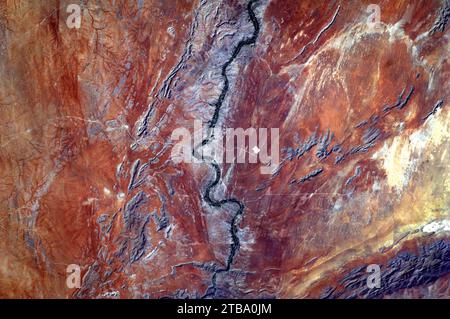 View from space of sand dunes, ancient rocks and the Orange River in the Kalahari Desert, Africa. Stock Photo