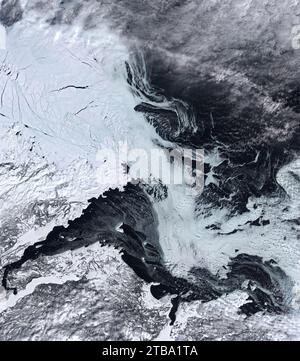 Natural-color satellite view of ice on the Labrador Sea. Stock Photo