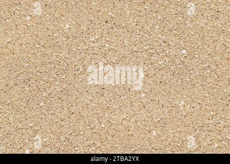 Sun shines to wet sand on beach - seamless tileable texture Stock Photo
