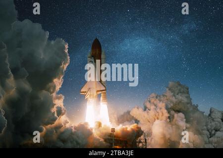 New Ship Rocket flies to Mars planet. Spaceship Shuttle with blast and smoke takes off into the starry sky. Rocket lift off and starts into deep space Stock Photo