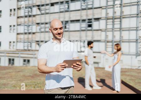 Successful Architects Collaborating on Urban Building Project Stock Photo