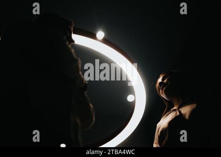 Successful Business Collaboration: Team Leaders Discussing Project Plans for Better Efficiency and Growth. Silhouette Photo. Stock Photo