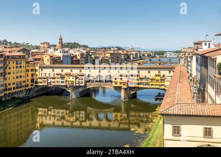 Florence, Italy - July 15, 2023: Ponte Vecchio bridge over Arno river in Florence, Italy Stock Photo