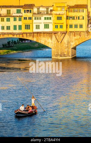 Florence, Italy - July 15, 2023: Ponte Vecchio bridge over Arno river in Florence, Italy Stock Photo