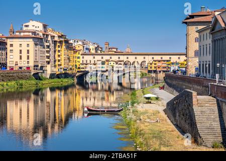 Florence, Italy - July 15, 2023: Ponte Vecchio bridge over Arno river in Florence, Italy Stock Photo