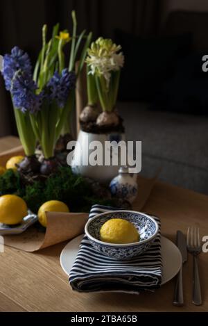 Spring table setting with flowers Stock Photo