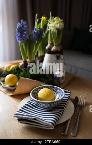 Spring table setting with flowers Stock Photo