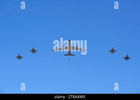 Arizona, USA. 3rd Dec, 2023. A U.S. Air Force KC-135 Stratotanker from the 161st Air Refueling Wing and four U.S. Air Force F-16 Fighting Falcons from the 162nd Fighter Wing conduct a flyover during the 2023 Arizona National Guard Muster at Sloan Park, Mesa, Ariz., Dec. 3, 2023. More than 3,200 Citizen-Soldiers and Airmen proudly assembled before Governor Hobbs and Major General Kerry L. Muehlenbeck, Adjutant General of Arizona and Director of the Arizona Department of Emergency and Military Affairs, as their family members and community supporters looked on. (Credit Image: © U.S. Nationa Stock Photo