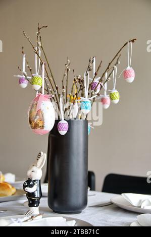 Decorated table served for Easter dinner Stock Photo