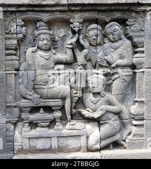 bas- relief panels in the ninth century mahayana buddhist temple of borobodur,  in magelang, java, indonesia Stock Photo