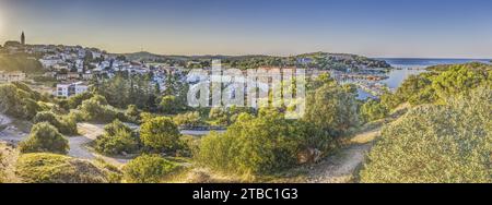 Panoramic picture of the Croatian harbor town of Vrsar on the Limski Fjord in the morning during sunrise Stock Photo