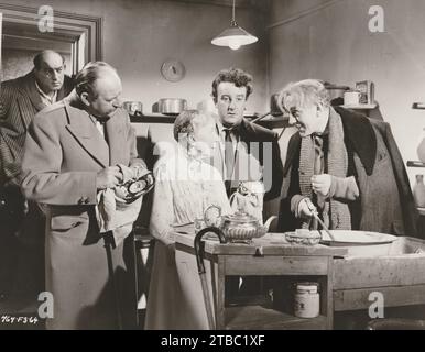 The Ladykillers (Rank, 1955). Starring Alec Guinness, Herbert Lom, Peter Sellers, Cecil Parker, and Danny Green. Ealing Studios Stock Photo