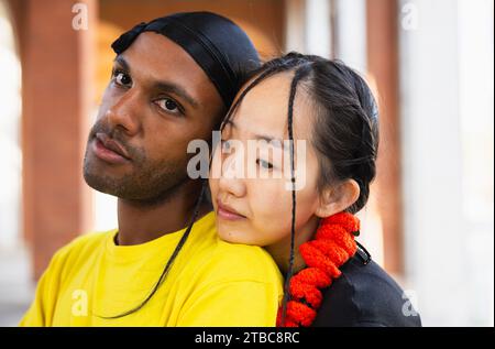 Close up of multiracial young men posing together relaxed Stock Photo