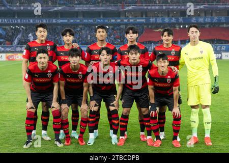 Wuhan, China. December 6, 2023. Players of Pohang Steelers pose for group photos before the 2023-2024 AFC Champions league football match between Wuhan Three Towns FC of China and Pohang Steelers of South Korea at Wuhan Sports Center Stadium in Wuhan, central China's Hubei Province, Dec. 6, 2023.Credit: Xinhua/Alamy Live News Stock Photo