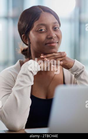 pretty, african american woman in thought at the office Stock Photo